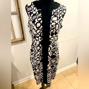 A fun print dress in black, grey, and white.